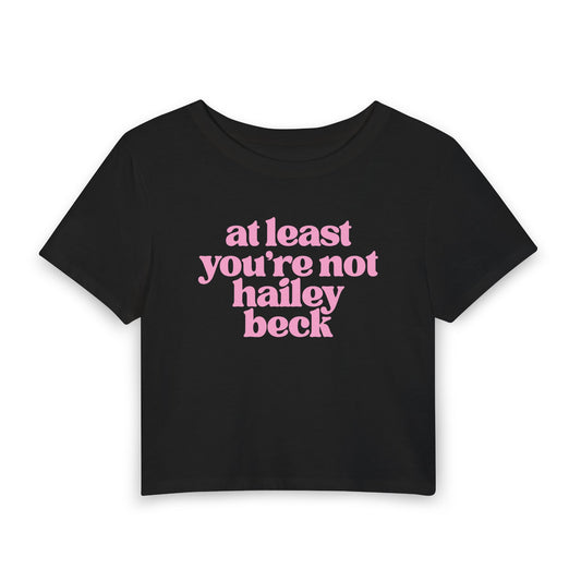 At Least You’re Not Hailey Beck Baby Tee | Funny Pop Culture Graphic Shirt
